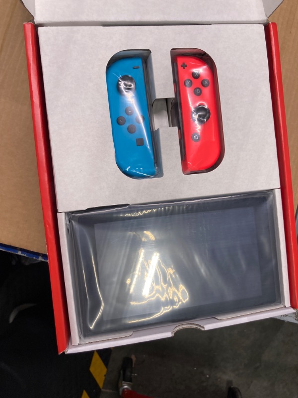 Photo 3 of Nintendo Switch™ with Neon Blue and Neon Red Joy?Con™ Console Neon