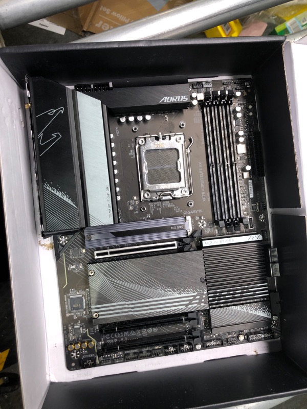 Photo 3 of ****USED** Micro Center AMD Ryzen 9 7900X 12-Core 24-Thread Unlocked Desktop Processor Bundle with GIGABYTE X670 AORUS Elite AM5 DDR5 PCIe 5.0 WiFi 6E ATX Motherboard AMD Ryzen 9 7900X + X670 AORUS ELITE AX ATX ****USED*** 