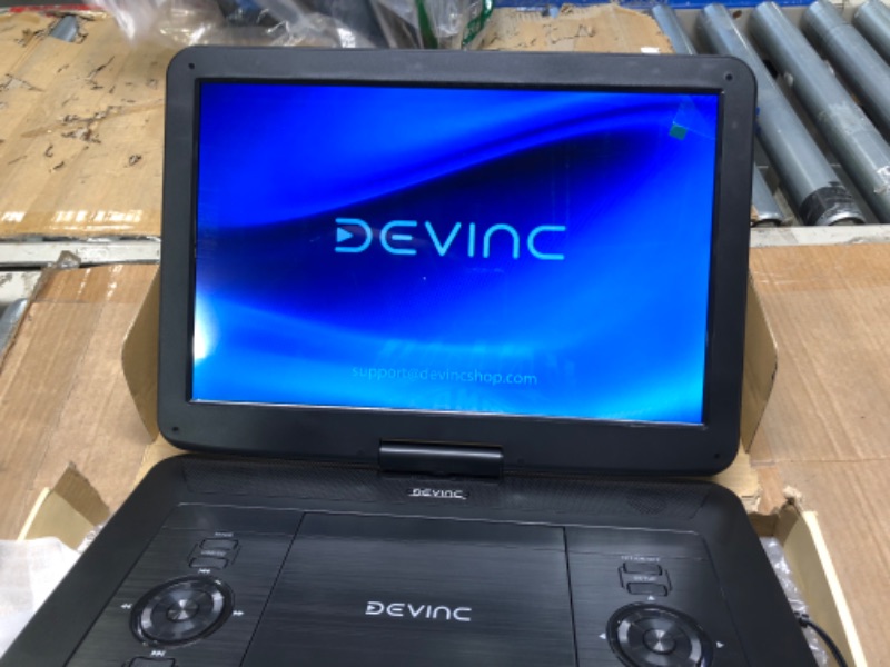 Photo 1 of DEVINC 17.9" Portable DVD Player with 15.6" HD Swivel Screen, Support Multiple DVD CD Formats/USB/SD Card/Sync TV, 6 Hours Rechargeable Battery, Car Charger, Remote Control, Region Free
