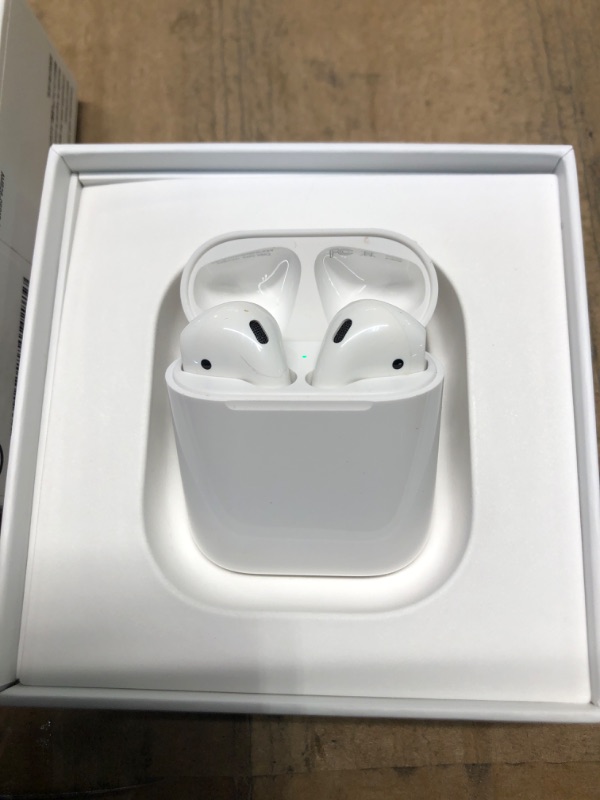 Photo 4 of Apple AirPods (2nd Generation) Wireless Ear Buds, Bluetooth Headphones with Lightning Charging Case Included, Over 24 Hours of Battery Life, Effortless Setup for iPhone Without AppleCare+