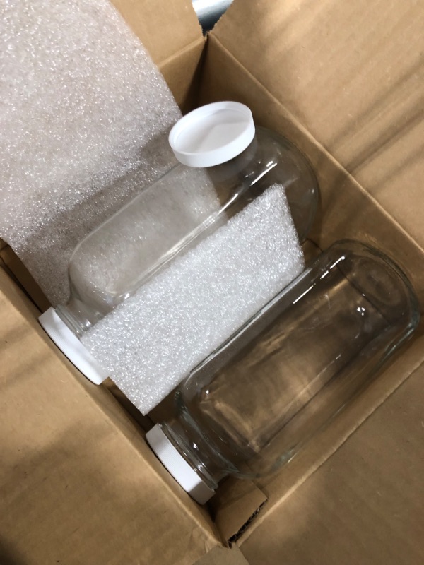 Photo 1 of **** ONLY ONE*****Kitchentoolz 32 Oz Square Glass Milk Bottles with Lids, Perfect Glass Milk Container for Refrigerator - 1 Liter Glass Milk Jugs with Tamper Proof Lid and Pour Spout - Pack of 2 2 33oz