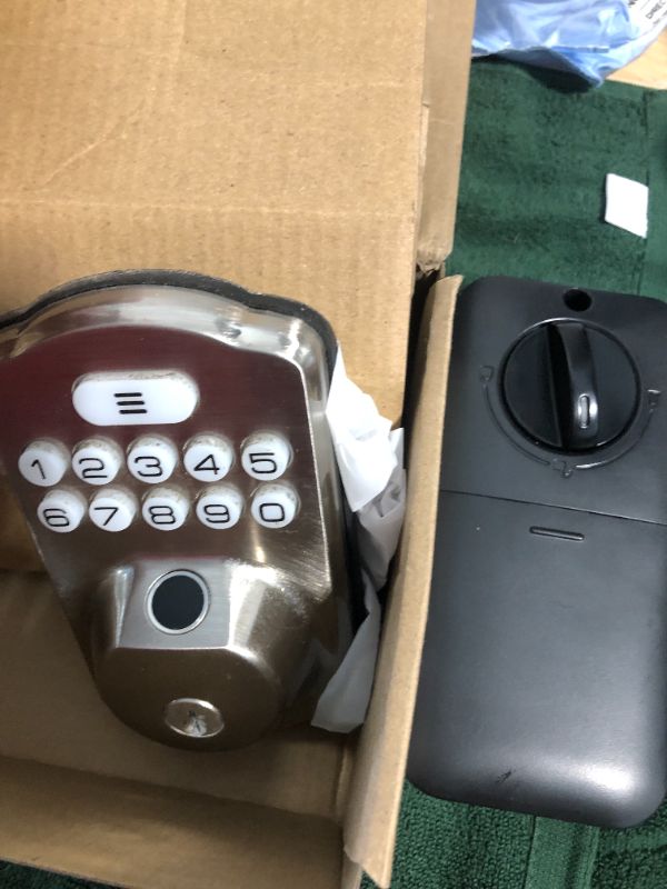 Photo 1 of *** NOT FUNCTIONAL****** FOR PARTS ONLY ** NO RETUNRS***
 Fingerprint Door Lock, Keyless Entry Door Lock, Electronic Keypad Deadbolt, Biometric Smart Locks for Front Door, Auto Lock, Anti-Peeking Password, Easy Install, Satin Nickel Satin Nickel Tradition
