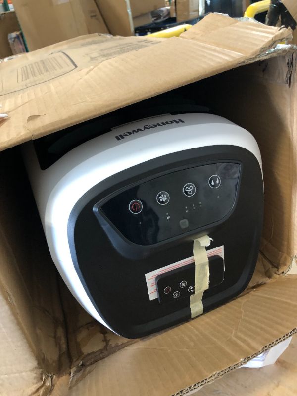 Photo 4 of ***USED***BOX IS IS DAMAGED*** Honeywell 2.6 Gallon Indoor Portable Evaporative Air Cooler for Garage, Basement, Attic, 115V, for up to 120 Sq. Ft. with Remote, Quiet, Low Energy, Compact, White 29.6"