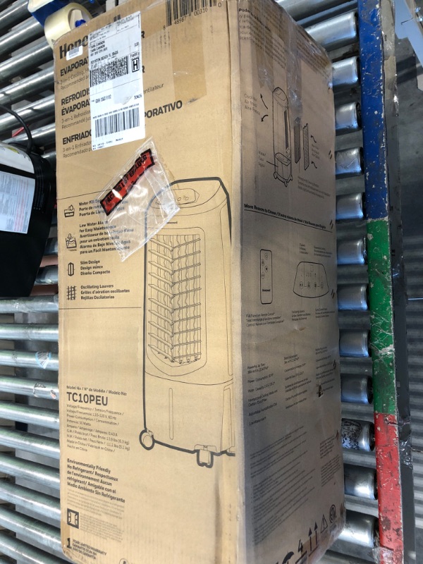 Photo 2 of ***USED***BOX IS IS DAMAGED*** Honeywell 2.6 Gallon Indoor Portable Evaporative Air Cooler for Garage, Basement, Attic, 115V, for up to 120 Sq. Ft. with Remote, Quiet, Low Energy, Compact, White 29.6"