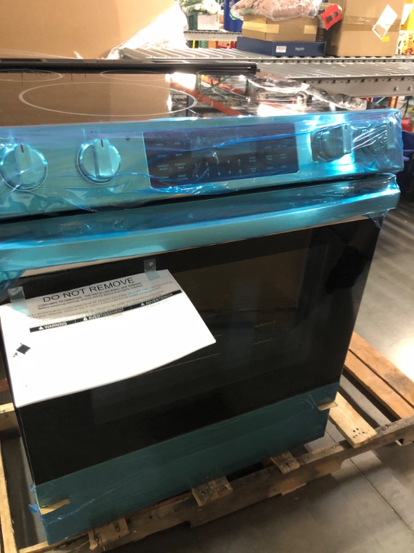 Photo 5 of ***PALLET OF BROKEN TV’S/ ELECTRONICS- NONREFUNDABLE- SOLD AS IS- TRUCK/TRAILER PICKUP ONLY***Cosmo Commercial Style 30 in. 6.3 cu. ft. Electric Range with 5 Burner Glass Cooktop and Self Clean Air Fry Oven in Stainless Steel