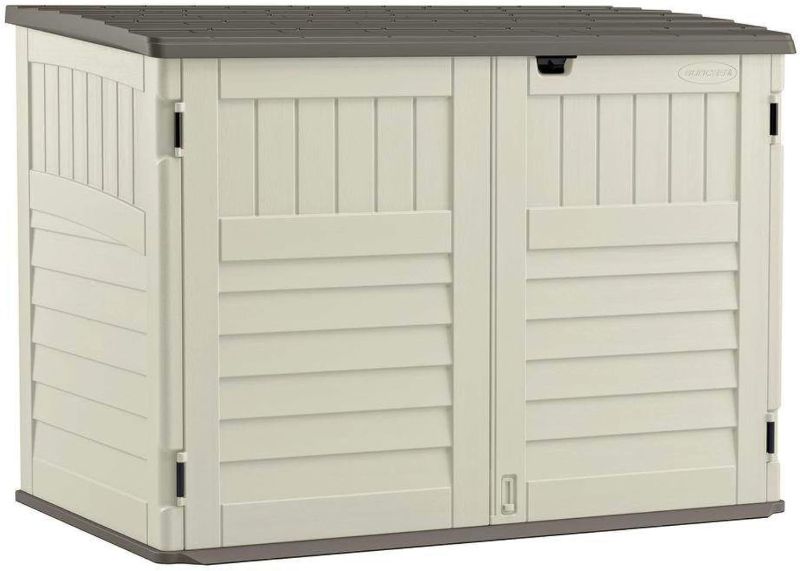 Photo 1 of ***TRUCK/TRAILER PICKUP ONLY***
Suncast 5.9 ft. x 3.7 ft Horizontal Stow-Away Storage Shed - Natural Wood-like Outdoor Storage for Trash Cans and Yard Tools - All-Weather Resin, Hinged Lid, Reinforced Floor - Vanilla and Stoney