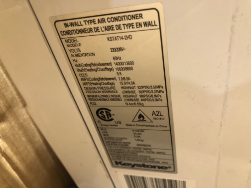 Photo 4 of **MINOR DAMAGE DENTED IN CORNER AND DIRTY**
Keystone 14,000 BTU Wall Mounted Air Conditioner with Supplemental Heat and Dehumidifier Function, 230V, Wall AC for Living Room and Large Rooms up to 700 Sq.Ft., Quiet, High Efficiency AC with Remote Heat/Cool 