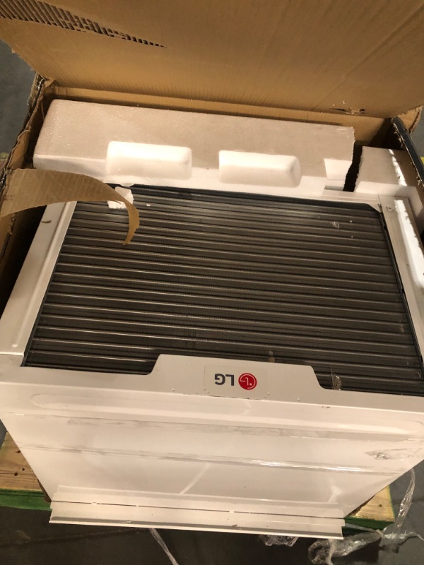 Photo 2 of **PICK UP TRUCK ONLY** LG LW2422IVSM 23,500 Dual Inverter Smart Window, 230V, Air Conditioner Cools Rooms up to 1,440 Sq. Ft, Ultra Quiet Operation, ThinQ, Amazon Alexa & Hey Google, 24000 BTU, Bright White 24000 BTU Wifi 230V Bright White