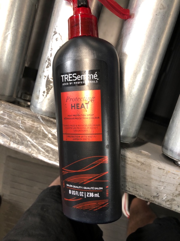 Photo 4 of **Like new 
TRESemmé Protecting Heat Spray Keratin Smooth for Taming Frizz & Reducing Breakage, with Protection up to 450°, 8 oz Pack of 6 