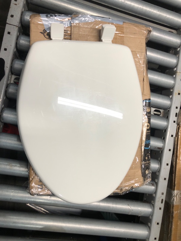 Photo 4 of ***STOCK PHOTO REFERENCE ONLY*** White Toilet Seat