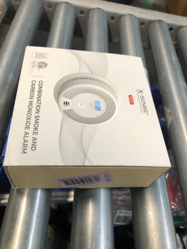 Photo 2 of ***FACTORY SEALED***
X-Sense 10-Year Battery Combination Smoke Carbon Monoxide Alarm Detector with Large LCD Display (Standalone Model) Standalone Model 1-Pack