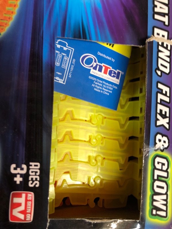 Photo 3 of ***USED - LIKELY MISSING PARTS - UNABLE TO VERIFY FUNCTIONALITY***
Ontel Magic Tracks 10 Foot Glow In The Dark Bendable Flexible Racetrack with LED Light-Up Race Car, Educational Playset Birthday Gift for Ages 3+