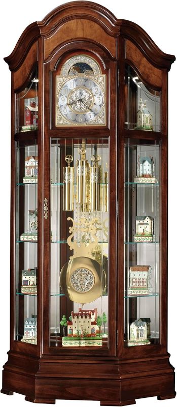 Photo 1 of **GLASS FACE OF CLOCK IS BROKEN. GLASS BROKEN THROUGHOUT. DAMAGED NEAR BOTTOM*SEE NOTES**Howard Miller Liskov Floor Clock II 549-028 – Large Windsor Cherry Curio Cabinet with Cable-Drive, Triple-Chime Movement with Volume Control
