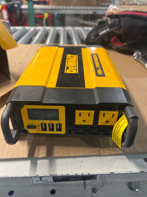 Photo 2 of **USED**
DEWALT DXAEPI1000 Power Inverter 1000W Car Converter with LCD Display: Dual 120V AC Outlets, 3.1A USB Ports, Battery Clamps
