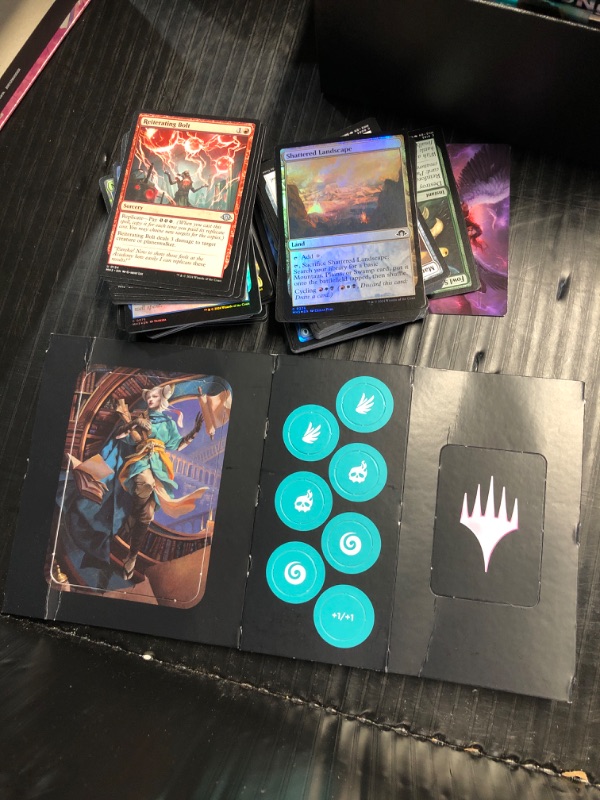 Photo 3 of ****MISSING PARTS/SEE NOTES*** Magic: The Gathering Modern Horizons 3 Bundle: Gift Edition – Deluxe Bundle with 1 Collector Booster, 9 Play Boosters, Full-Art Lands + Exclusive Accessories