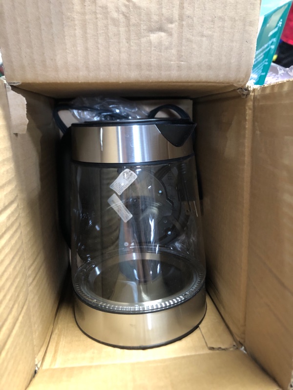 Photo 2 of ***(PARTS ONLY/ NO RETURNS OR REFUNDS) ***
Amazon Basics Electric Glass and Steel Hot Tea Water Kettle - 1.7-Liter