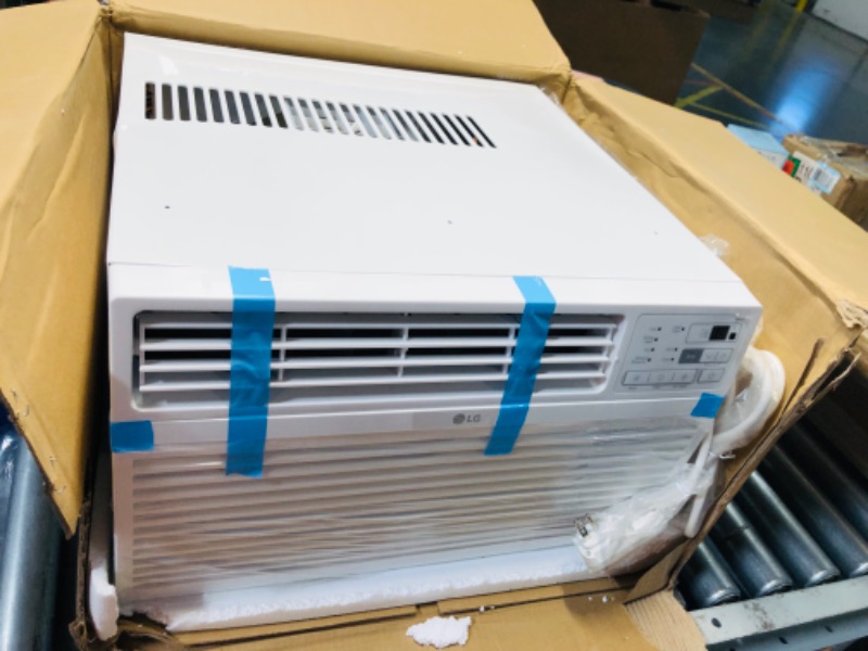 Photo 10 of ***USED - COVERED IN DENTS - UNABLE TO TEST - LIKELY MISSING PARTS***
LG 8,000 BTU Smart Window Air Conditioner, 115V, AC Window Unit for Rooms up to 350 Sq. Ft., Perfect for Bedroom or Office, Smartphone and Voice Control, Works with LG ThinQ, Amazon Ale