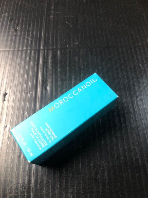 Photo 2 of **APPEARS NEW** Moroccanoil Shimmering Body Oil, 1.7 Fl Oz