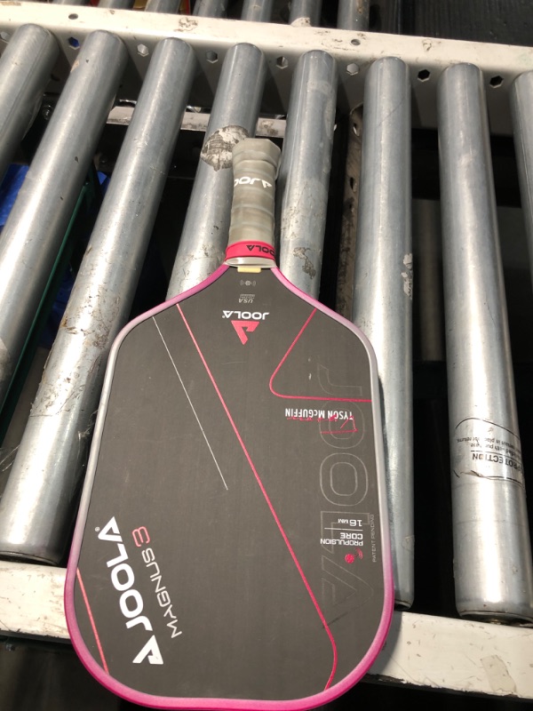 Photo 3 of **MINOR DAMAGE PREV USED**
JOOLA Tyson McGuffin Magnus 3 16mm Pickleball Paddle with 1 Replacement Grip - Elongated Short Handle Pickleball Paddle - Charged Carbon Surface Technology - Carbon Fiber Racket, Hot Pink Edge Guard