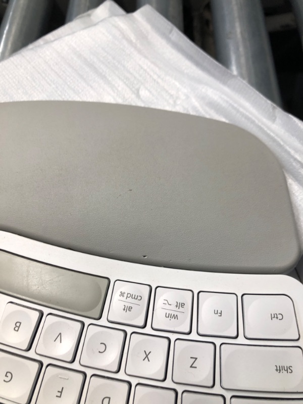 Photo 3 of **MINOR DAMAGE USED AND DAMAGE TO ARM REST-SPACE BAR IS NOT PINK FOR ACTUAL ITEM**
Nulea RT05B Wireless Ergonomic Keyboard, Split Keyboard with Cushioned Wrist Rest, Bluetooth and USB Connectivity, USB-C Rechargeable Pink Grey