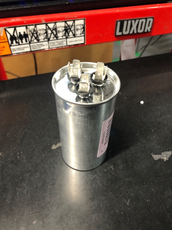 Photo 2 of ***STOCK PHOTO REFERENCE ONLY***
Canamax 20 uf MFD 370-440 VAC Volts CBB65 Run Start Capacitor 50/60 Hz AC Electric - Exact Fit for OEM Single Phase Motor Capacitors Condenser Straight Cool or Heat Pump Air Conditioner