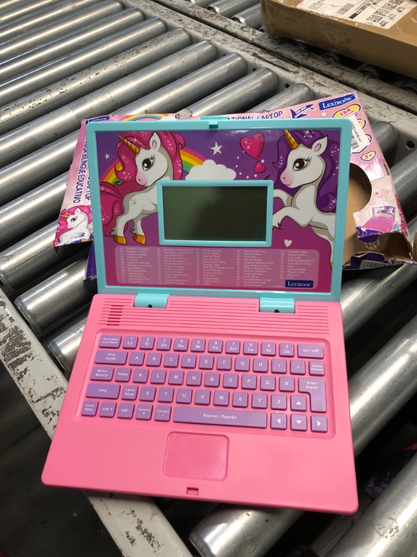 Photo 3 of **MISSING MOUSE**
LEXiBOOK - Unicorn Educational and Bilingual Laptop Spanish/English - Toy for Children with 124 Activities to Learn Mathematics, Dactylography, Logic, Clock Reading, Play Games and Music - JC598UNIi2