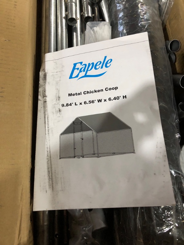 Photo 4 of ***USED - LIKELY MISSING PARTS - UNABLE TO VERIFY FUNCTIONALITY***
Eapele 9.8'x6.5'x6.4', Large Metal Chicken Coop Heavy Duty for Outdoor Chicken Pens with Reforced Tri-Supporting Steel Frame, Silver, Spire Roof