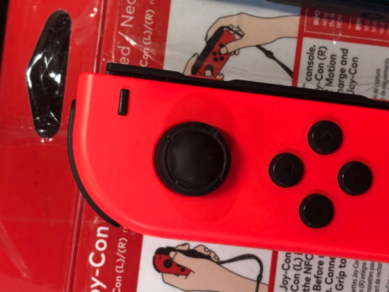 Photo 4 of ***USED - UNABLE TO TEST - NO ACCESSORIES***
Nintendo Joy-Con (L/R) - Neon Red/Neon Blue