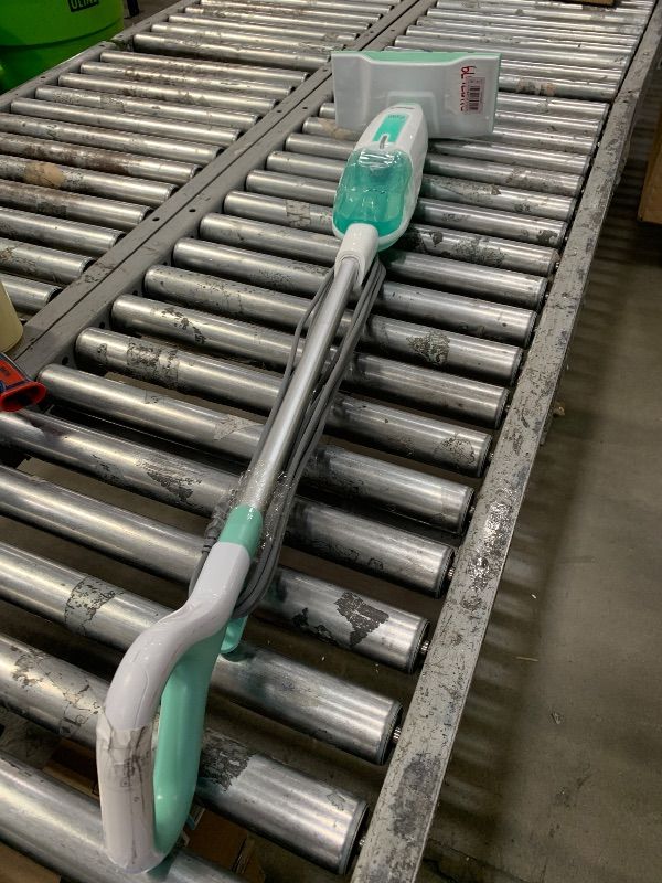 Photo 1 of **HEAVILY USED**
Shark S1000 Steam Mop with 2 Dirt Grip Pads, Lightweight, Safe for all Sealed Hard Floors like Tile, Hardwood, Stone, Laminate, Vinyl & More, Machine Washable, Removable Water Tank, White/Seafoam
