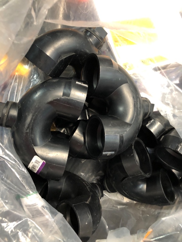 Photo 2 of **10 PACK** 1-1/2 in. ABS DWV Hub x Hub P-Trap with Clean Out
