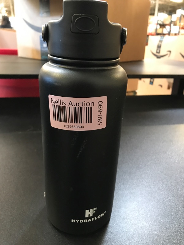 Photo 1 of 34 Oz  Flipstraw Bottle