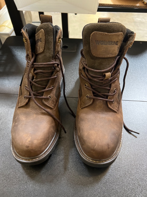 Photo 2 of   size 9.5 Wolverine steel toed lace up work boots size 11