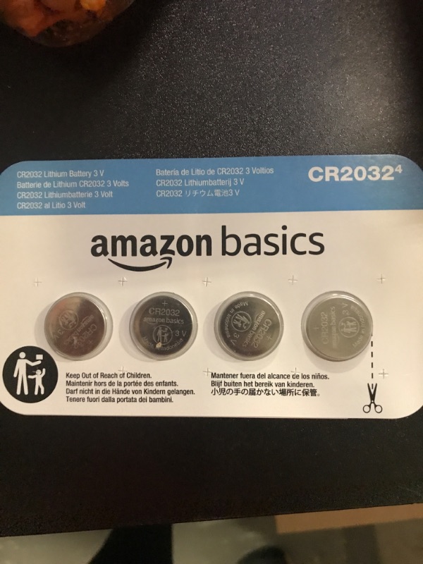 Photo 2 of Amazon Basics 4-Pack CR2032 Lithium Coin Cell Battery, 3 Volt, Long Lasting Power, Mercury-Free 4 Count (Pack of 1) CR2032