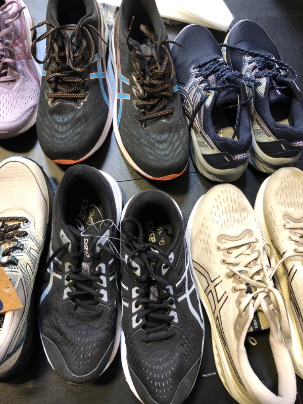 Photo 1 of BOX LOT FILLED WITH NEW AND OR USED shoes all different styles colors and colors no returns or exchanges both men and womens 
