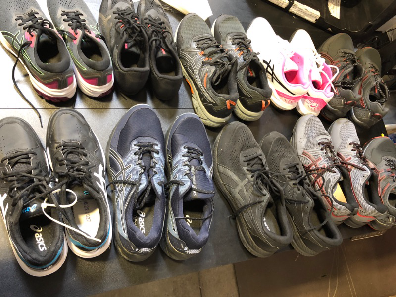 Photo 1 of BOX LOT FILLED WITH NEW AND OR USED shoes all different styles colors and colors no returns or exchanges both men and womens   pink and white 
