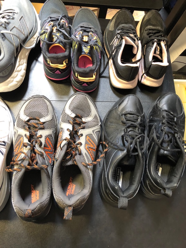 Photo 3 of new balance shoes mystery box lot shoes are USED sizing color and styles do vary no return or exchanges some are stained some are worn  as well as hiking shoes pink black white 