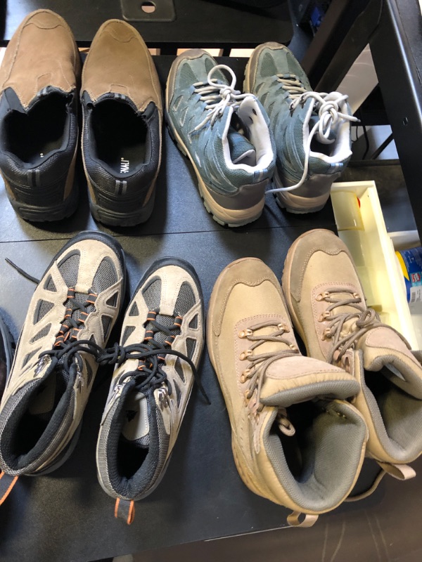 Photo 2 of hiking camping shoes mystery box lot shoes are USED sizing color and styles do vary no return or exchanges some are stained some are worn  