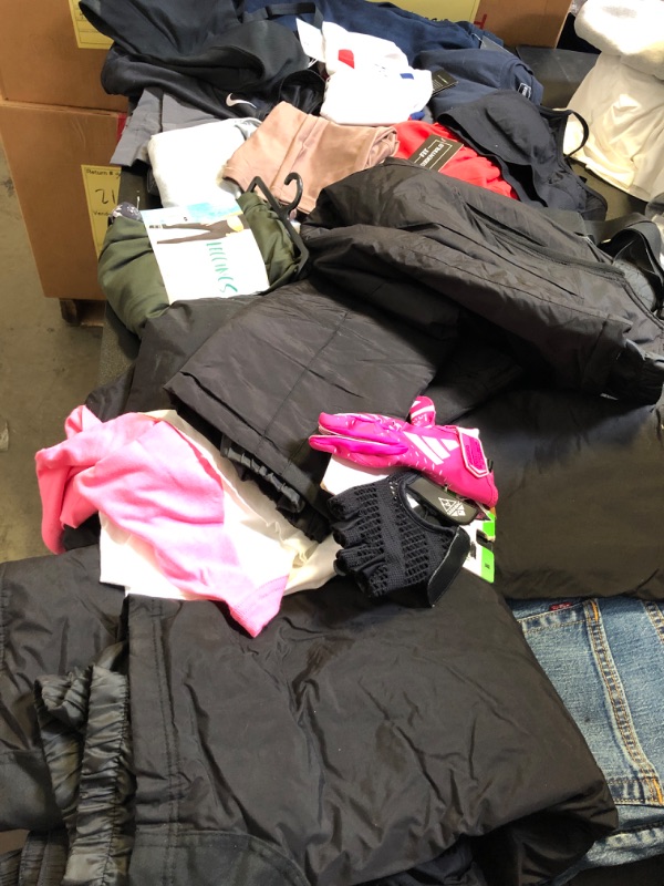 Photo 1 of clothing box lot clothing is new but stained sizing colors and style vary per item no returns or exchanges sports bra pink leggings nike etc ;  LEVIS