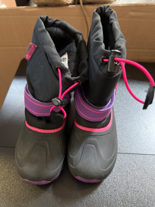 Photo 1 of KIDS SNOW BOOTS   SIZE 1