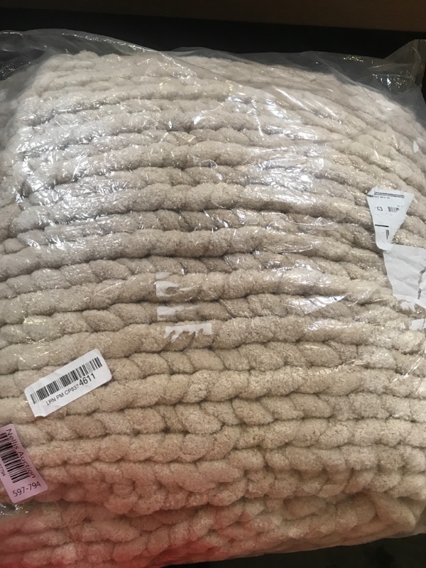 Photo 1 of brown knots blanket