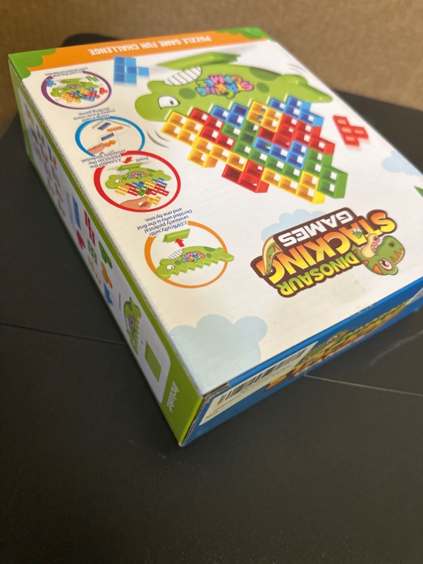 Photo 1 of LIMYIOM 64Pcs Tetra Tower Game, Stack Attack Family Board for 2 Players Family Games, Dinosaur Building Blocks Stacking Balance Games Toys for Kids, Adults, Friends, Travel Party and Family Game Night