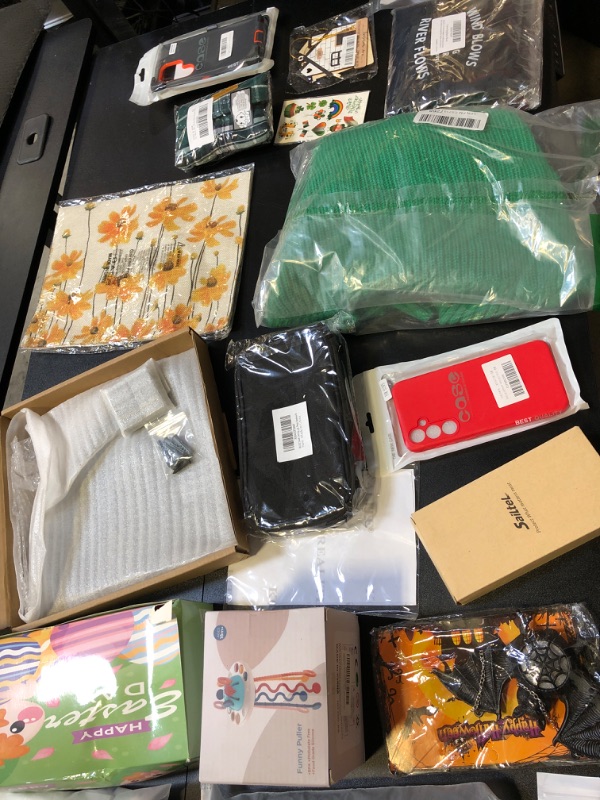 Photo 3 of bag lot mystery filled with various items all different styles , colors , and sizes no returns or exchanges  phone cases easter clothing