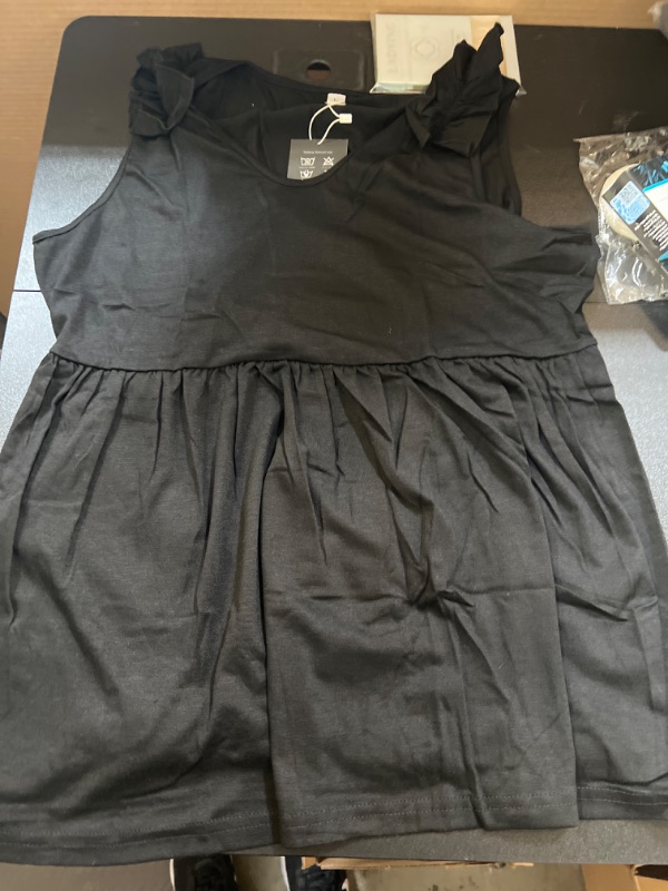 Photo 1 of WOMENS CROP TOP SIZE LARGE 