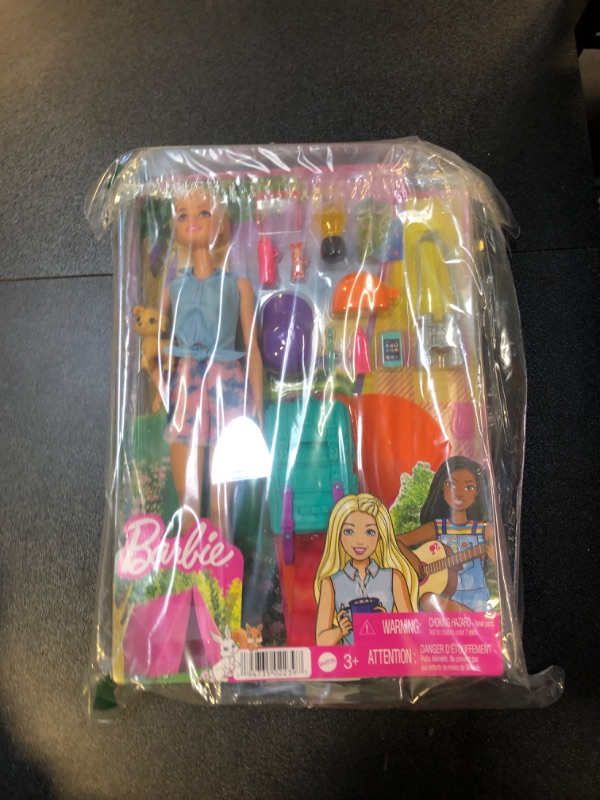Photo 2 of Barbie It Takes Two Doll & Accessories, Malibu Camping Playset with Doll, Pet Puppy & 10+ Accessories Including Sleeping Bag