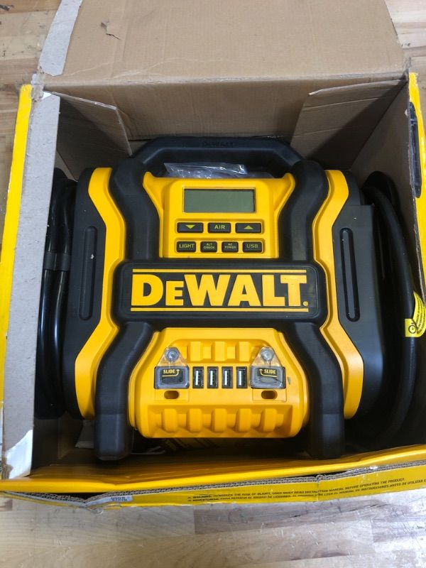 Photo 2 of DEWALT DXAEPS14 1600 Peak Battery Amp 12V Automotive Jump Starter/Power Station with 500 Watt AC Power Inverter, 120 PSI Digital Compressor, and USB Power , Yellow