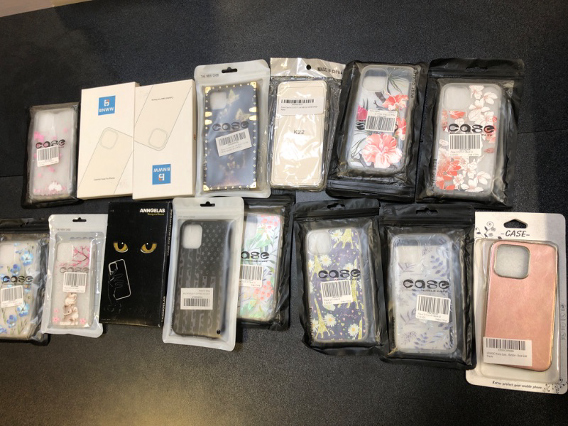 Photo 1 of ASSORTED CELL PHONE COVER BAG LOT, VARIOUS SIZES AND COLORS, ALL PHONE COVERS SOLD AS IS