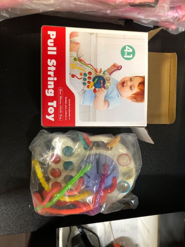 Photo 1 of AEROQUEST Montessori Toys for 6-12-18 Months, Baby Sensory Toys for Boys and Girls, Montessori Pull String Airplane Travel Toys for Baby, Learning & Educational Toy Birthday Gifts for Infant Boys Girl Ivory Medium
