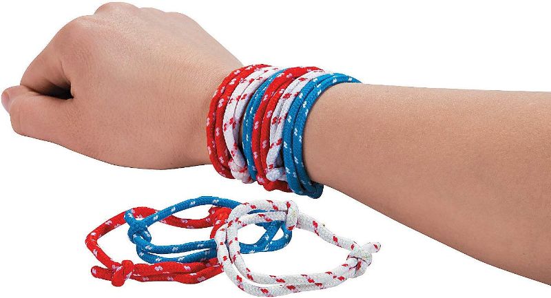 Photo 1 of Fun Express Adjustable Patriotic Friendship Rope Bracelets - Bulk Set of 72 Red, White and Blue - Fourth of July Jewelry and Party Favors
