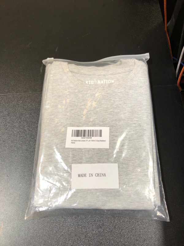 Photo 1 of KIDS T SHIRT 
SIZE SMALL GREY 
