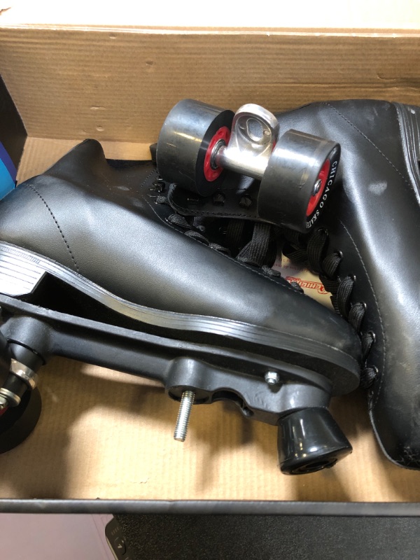 Photo 5 of Chicago Classic Men's Rink Skates
size  9 (major damage to wheels)